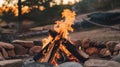 Campfire Burning Brightly in a Stone Fire Pit During the Evening Royalty Free Stock Photo