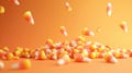 Vibrant Candy Corn Deluge on Festive Orange Background Royalty Free Stock Photo