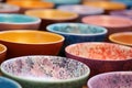 Vibrant Ceramic bowl with colorful powder. Generate Ai