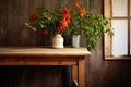 a vibrant chili pepper plant on a rustic wooden kitchen table