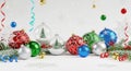 Vibrant Christmas ornaments on a snowy background. Royalty Free Stock Photo