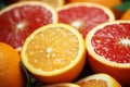 Vibrant citrus slices: close up captures the juicy allure of oranges and grapefruits
