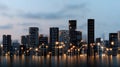 A vibrant city skyline illustrates the integration of technology with binary code overlaying modern buildings under a Royalty Free Stock Photo