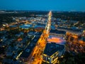 Vibrant city street view at night with illuminated buildings in Downtown Birmingham Michigan