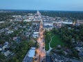 Vibrant city street view at night with illuminated buildings in Downtown Birmingham Michigan