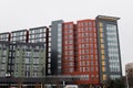 Vibrant cityscape featuring a multitude of colorful buildings situated along a bustling street Royalty Free Stock Photo