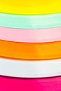 Vibrant close-up of assorted colorful plastic plates Royalty Free Stock Photo