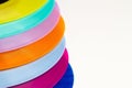 Vibrant close-up of assorted colorful plastic plates Royalty Free Stock Photo