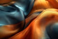 A vibrant close-up of blue and orange silk fabric against a dark background. Royalty Free Stock Photo
