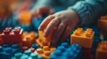 Vibrant close up of child playing with colorful plastic blocks in ultra high definition