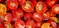 Vibrant close-up of halved tomatoes, showcasing their freshness, organic nature, juiciness, and appetizing appeal