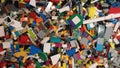 A vibrant, close-up, overhead view of a large, messy pile of assorted colorful plastic building blocks Royalty Free Stock Photo