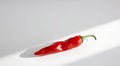 Red Chili Pepper on White Surface Royalty Free Stock Photo