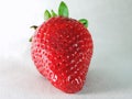 Vibrant Close-Up of a Red Strawberry on White Background Royalty Free Stock Photo