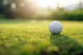 Vibrant Close-up Shot of Golf Ball on Tee with Beautifully Blurred Green Bokeh Background