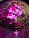 Vibrant closeup of a colorful disco ball.