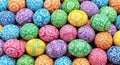 A vibrant collection of colorful Easter eggs with intricate white designs Royalty Free Stock Photo