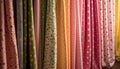 A vibrant collection of multi colored striped curtains in a row generated by AI