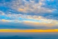 Vibrant color cloud scape on a dramatic sky. Image was captured on a sunny summer day in sunset time. Outdoor travel photography.