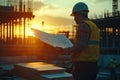 Construction Site Blueprint Review at Sunset Architect and Engineer Planning Royalty Free Stock Photo