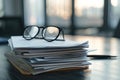 Vibrant Color Image of Stack of Documents, Eyeglasses, and Pen on Office Table Royalty Free Stock Photo