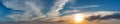 Vibrant color panoramic sun rise and sun set sky with cloud on a cloudy day Royalty Free Stock Photo