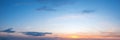 Vibrant color panoramic sun rise and sun set sky with cloud on a cloudy day. Royalty Free Stock Photo