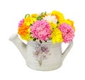 Vibrant colored Chrysanthemum flowers in a white watercan, bouquet, close up, floral arrangement