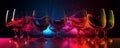 Vibrant Colored Light Reflections in Elegant Wine Glasses on Dark Background Royalty Free Stock Photo