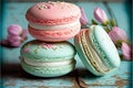 Vibrant colored pastel French macaroons in pink and mint flavours