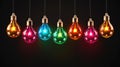 Vibrant colorful glass bulbs. Multi-colored electric lights on dark background