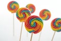 Colorful Spiral Lollipops on White Background. Rainbow Candy Collection in Studio Photography Royalty Free Stock Photo