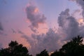 Vibrant colors in clouds of approaching storm at sunset Royalty Free Stock Photo