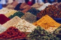 Piles of spices on display at a Moroccan souk market in a medina, generative AI Royalty Free Stock Photo