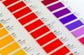 Vibrant colors swatches - adhesive film - with colour names in English, German and French, closeup detail