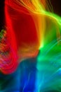 Vibrant coloured light trails from fibre optic strands. Royalty Free Stock Photo