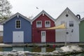 Vibrant Coloured wooden beach. Red. Blue. White.