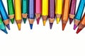 Vibrant creativity colorful crayons frame border on a white background Royalty Free Stock Photo