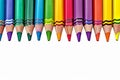 Vibrant creativity colorful crayons frame border on a white background Royalty Free Stock Photo