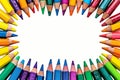 Vibrant creativity colorful crayons frame border on a white background Royalty Free Stock Photo