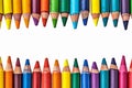 Vibrant creativity colorful crayons frame border on a white background Royalty Free Stock Photo