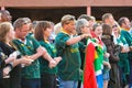 A crowd of people with jerseys and Kenyan flags supporting their team at a rugby event Royalty Free Stock Photo