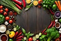 Vibrant Culinary Scene: Cutting Board Surrounded by Assorted Fresh Vegetables and Spice Herbs