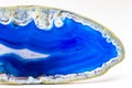 Vibrant deep blue and semi-transparent agate geode slice crystal