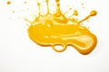 Vibrant and delicious single splash of yellow mustard sauce isolated on white background