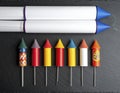 A vibrant display of assorted colorful fireworks and rockets ready for a festive celebration Royalty Free Stock Photo