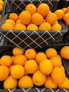 Vibrant display of fresh oranges arranged in a basket Royalty Free Stock Photo