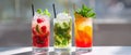 The vibrant display of refreshing cocktails garnished with mint and fruit. AI generated image Royalty Free Stock Photo