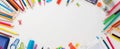 Colorful school supplies arranged on a bright white background, perfect for educational themes Royalty Free Stock Photo