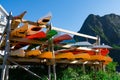 Colorful Kayaks Stored on Racks at an Outdoor Adventure Center